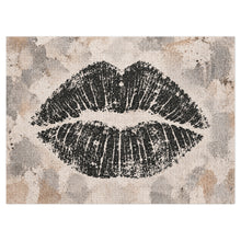 Cargar imagen en el visor de la galería, Lip Print jigsaw puzzle featuring an oversized black lip impression on a layered neutral cream, taupe, gray and stone background, from Little Yellow Bungalow.
