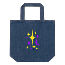 Cargar imagen en el visor de la galería, Astro Glow organic cotton denim tote bag with electric purple and luminous yellow starburst artwork by Little Yellow Bungalow

