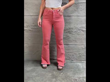 Carregar e reproduzir vídeo no visualizador da Galeria, RISEN Bailey High Rise Raw Side Slit Hem Flared Leg Pink Denim Jeans
